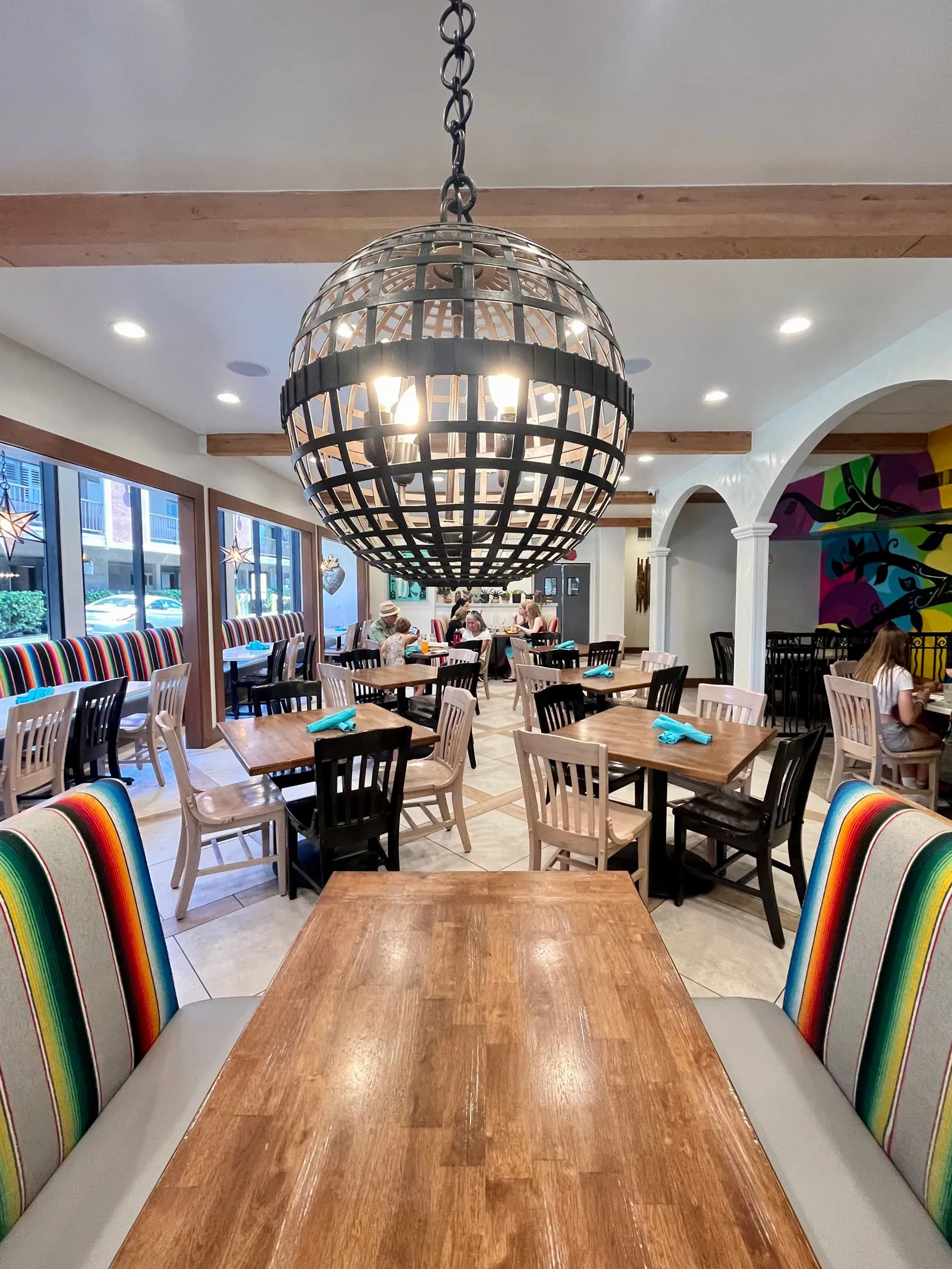 An inviting restaurant interior prepared for dinner service