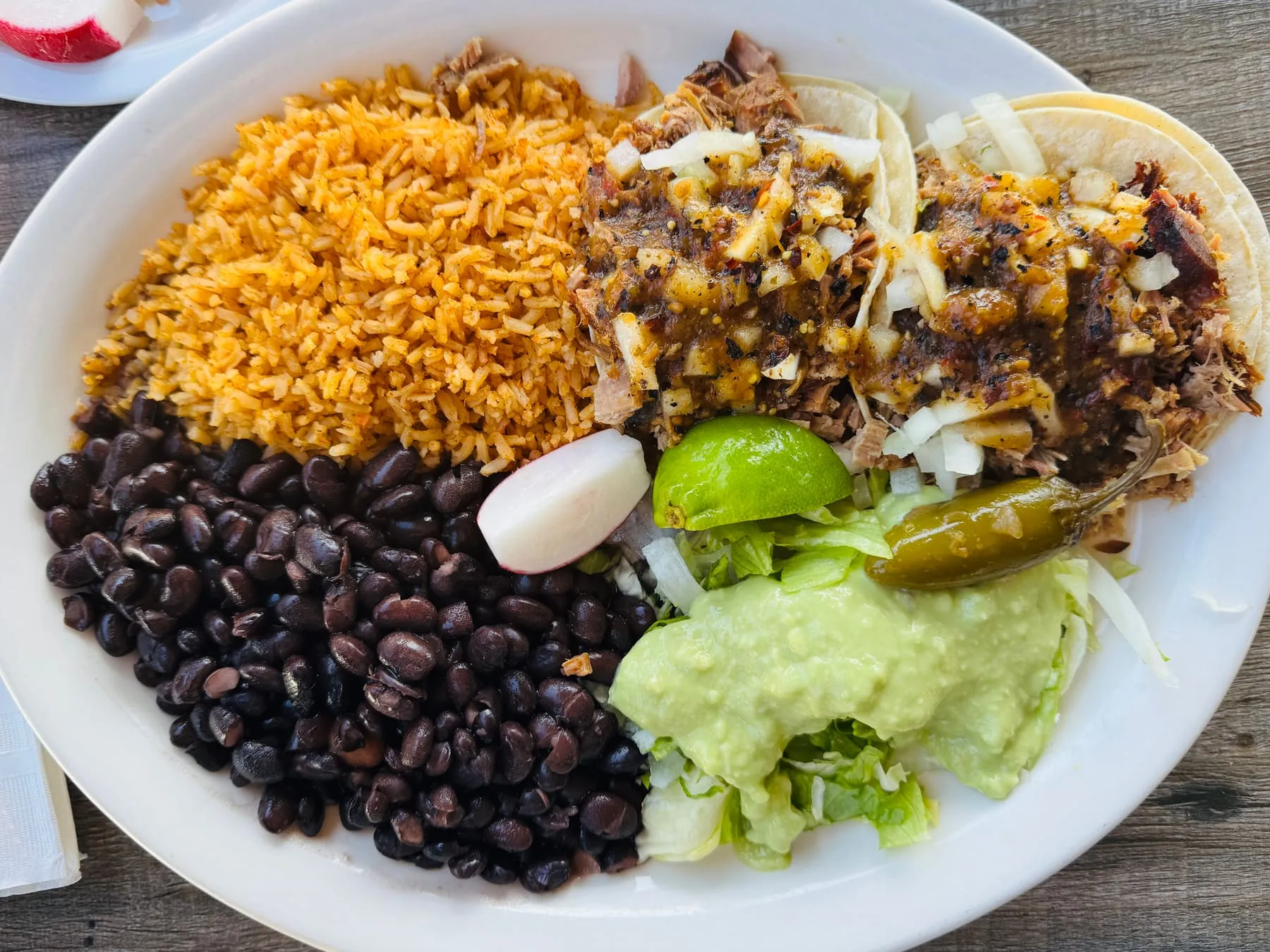 A colorful plate of tacos prepared for sharing